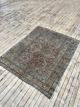 antique Persian accent rug sustainable home decor at Woven Kin Home