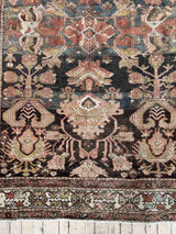 Hand-knotted vintage Persian rug with abrash and intricate border