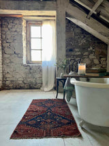 antique vintage area rug sustainable home decor at Woven Kin Home