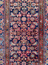 Colorful vintage Persian runner rug close-up