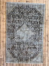 antique Persian accent rug sustainable home decor at Woven Kin Home
