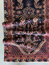 vintage Persian Hamadan runner rug with brick red and peach herati motif and navy blue field