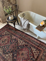 antique vintage area rug sustainable home decor at Woven Kin Home