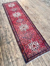 Red Vintage Persian Runner Rug with white and blue medallions