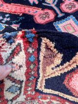 Close-up of plush pile on a vintage Caucasian Kuba accent rug