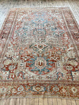 antique Persian rug at Woven Kin Home