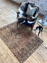 antique Persian accent rug sustainable home decor at Woven Kin Home
