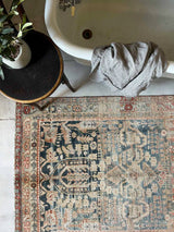 antique vintage area rug sustainable home decor at Woven Kin Home