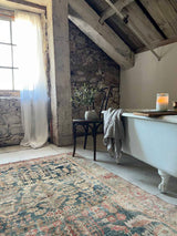 antique vintage area rug sustainable home decor at Woven Kin Home