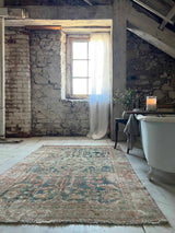antique vintage area rug sustainable home decor at Woven Kin Home