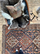 antique Persian area rug at Woven Kin Home sustainable home decor