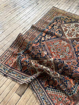 antique Persian area rug at Woven Kin Home sustainable home decor