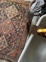 antique Persian area rug at Woven Kin Home sustainable home decor