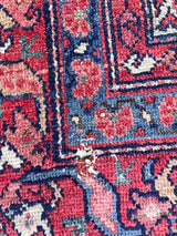 Close-up of an Antique Persian area rug repair