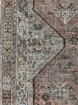 Antique Persian area rug sustainable home decor at Woven Kin Home