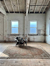 Antique Persian area rug sustainable home decor at Woven Kin Home