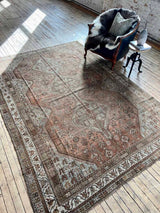 Antique Persian area rug sustainable home decor at Woven Kin Home
