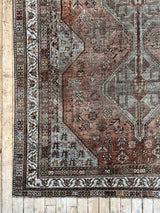 Antique Persian area rug sustainable home decor at Woven Kin Home