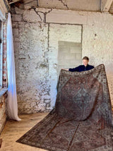 Antique Persian area rug sustainable home decor at Woven Kin Home