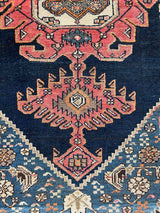 Colorful vintage area rug close-up medallion