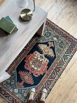 desk with Colorful vintage area rug