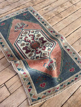 Vintage Turkish mini rug at Woven Kin Home