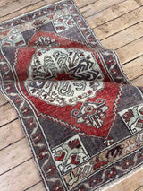 Vintage Turkish mini rug at Woven Kin Home