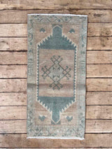 Vintage Turkish mini rug at Woven Kin Home