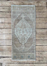 Vintage Turkish mini rug at Woven Kin Home