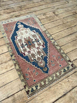 Vintage Turkish mini rug at Woven Kin Home
