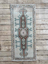 Vintage Turkish mini rug at Woven Kin Home