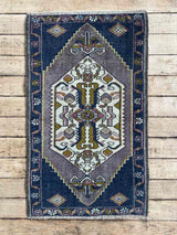 Vintage Turkish mini rug at Woven Kin Home