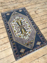 Vintage Turkish mini rug at Woven Kin Home