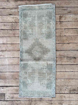 Vintage Turkish mini rug at Woven Kin Home