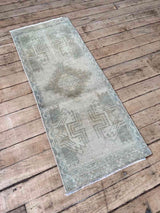 Vintage Turkish mini rug at Woven Kin Home