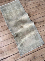 Vintage Turkish mini rug at Woven Kin Home