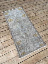 Vintage Turkish mini rug at Woven Kin Home