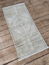 Vintage Turkish mini rug at Woven Kin Home