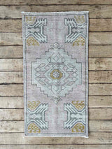 Vintage Turkish mini rug at Woven Kin Home