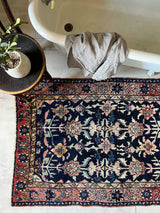 Vintage Persian rug sustainable home decor at Woven Kin Home