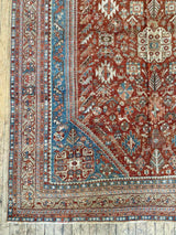 vintage Persian area rug at Petrichor Vintage Co.