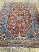 vintage Persian area rug at Petrichor Vintage Co.