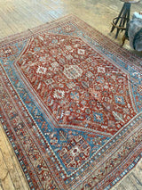 vintage Persian area rug at Petrichor Vintage Co.