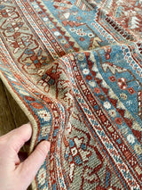 vintage Persian area rug at Petrichor Vintage Co.