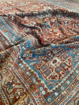 vintage Persian area rug at Petrichor Vintage Co.
