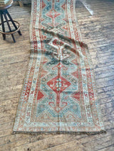 antique Persian runner rug at Petrichor Vintage Co.