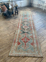 antique Persian runner rug at Petrichor Vintage Co.