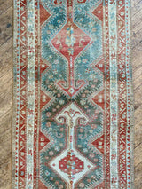 antique Persian runner rug at Petrichor Vintage Co.