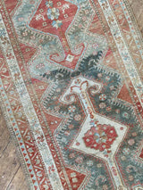 antique Persian runner rug at Petrichor Vintage Co.