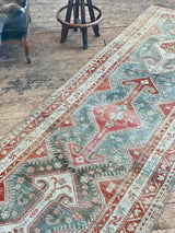 antique Persian runner rug at Petrichor Vintage Co.